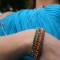 Swarovski Crystal Stretch Bracelets shown in (left to right) Zircon, Hyacinth, Peridot & Fuchsia. Shown with Long Necklace in Tropicana.