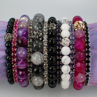 Gemstone & Swarovski Crystal Stretch Bracelets shown in (left to right) 6mm Onyx Gemstone, Fuchsia Swarovski Crystal, 10mm Purple Moss Agate, Black Diamond Swarovski Crystal, 10mm Rutilated Quartz, Crystal (Clear) Swarovski Crystal, 7mm Onyx, Purple Velvet Swarovski, 7mm White Howlite, Tanzanite Swarovski Crystal, 10mm Fuchsia African Agate, Jet (Black) Swarovski Crystal