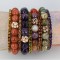 Gemstone & Swarovski Crystal Stretch Bracelets shown in Crystal Dorado Swarovski Crystal, 10mm Sunstone, Light Colorado Topaz Swarovski Crystal, 12mm Amethyst, Olivine Swarovski Crystal, 10mm Multi Fire Agate, Smoked Topaz Swarovski Crystal, 10mm Flowering Jasper, Purple Velvet Swarovski Crystal