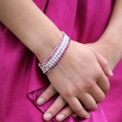 Swarovski Crystal Stretch Bracelets shown in (top to bottom) Rose, White Opal, Clear & Fuchsia in Silver.