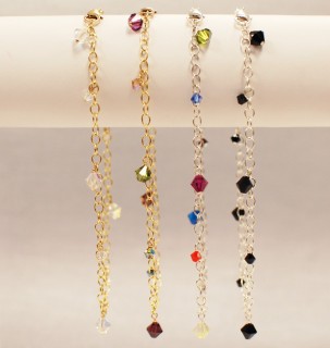 Dangle Anklets shown in (left to right): 18k Gold Vermeil Crystal (Clear AB), 18k Gold Vermeil Earth, Sterling Silver Multi, Sterling Silver Black
