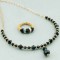 Crystal Lite Necklace in 18K Gold Vermeil Jet (Black) shown with the Stretch Ring in Jet (Black).