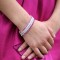 Swarovski Crystal Stretch Bracelets shown in (top to bottom) Rose, White Opal, Clear & Fuchsia in Silver.