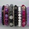 Gemstone & Swarovski Crystal Stretch Bracelets shown in (left to right) 6mm Onyx Gemstone, Fuchsia Swarovski Crystal, 10mm Purple Moss Agate, Black Diamond Swarovski Crystal, 10mm Rutilated Quartz, Crystal (Clear) Swarovski Crystal, 7mm Onyx, Purple Velvet Swarovski, 7mm White Howlite, Tanzanite Swarovski Crystal, 10mm Fuchsia African Agate, Jet (Black) Swarovski Crystal